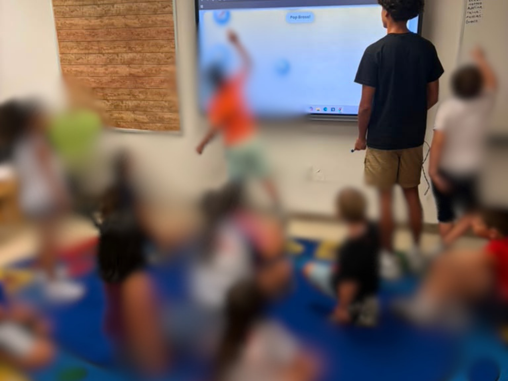 Students participating in a summer music activity